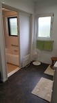洗面、浴室にあったとなりの納戸を壊し、空間をつなげ、補強もしっかりと。その新しい空間はとても広く、ゆとりがある凛とした場所になりました